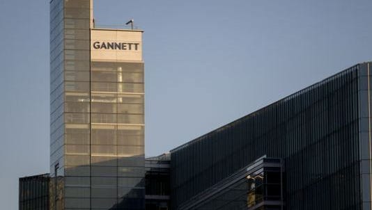 The Gannett Co. Inc. headquarters stands in McLean, Virginia, U.S., on Friday, July 24, 2015. Following a June 29 spinoff of its broadcasting and digital businesses into a new company Tegna Inc., the new Gannett Co. Inc. has a portfolio of 110 media outlets in the U.S. and U.K., including USA Today and Newsquest, a regional U.K. publisher.