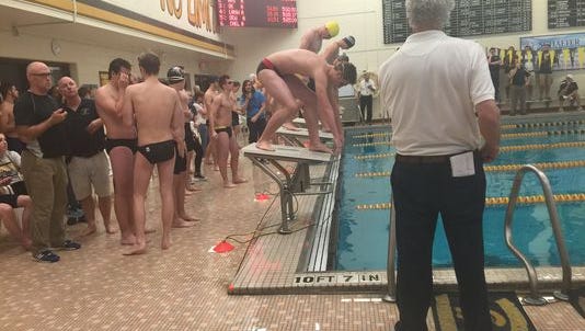 Take a look at the top high school swimming and diving performance in mid-Michigan.