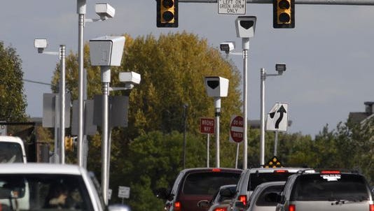 The Colorado Senate passed a statewide ban on red-light and speeding cameras despite objections from some lawmakers that the bill would decrease traffic safety.