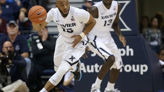 Myles Davis (left) and the Musketeers will open the regular season Nov. 11 against Lehigh at Cintas Center.