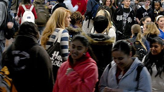 Students crowd the hallways at Damonte Ranch High School.