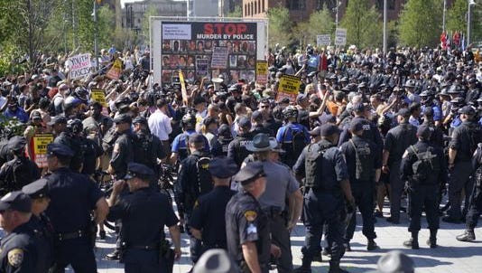 Police and protesters in Cleveland on Tuesday.