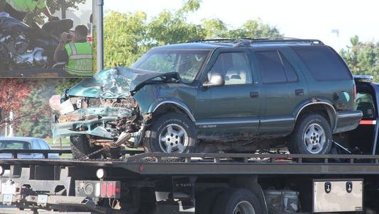 Steven Mark Kelty, the driver of the 1997 Chevrolet TrailBlazer, is serving a prison sentence in connection with the fatal crash that killed a Hamburg Township police sergeant who was riding the 2014 Harley Davidson motorcycle (inset) at the intersection of Latson Road and Figurski Drive in Genoa Township in September 2014.