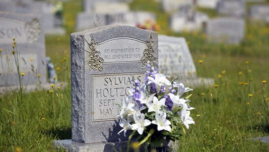 Sylvia Holtzclaw and two others were killed at Blue Ridge Savings Bank in Greer in 2003.