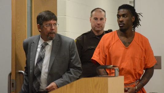 Christian Logan enters the courtroom for his sentencing.