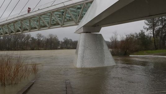 The Sacramento River has flooded portions of the Sundial Bridge in Redding.