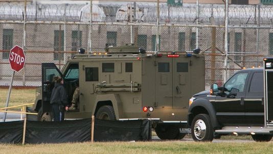 Officers respond to a siege at Vaughn prison near Smyrna in February.