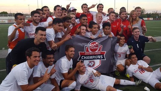 Dixie State men's soccer players celebrate their PacWest title Thursday, November 3, 2016.