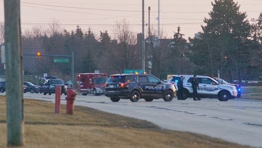 Police negotiated with a man who had taken four hostages Jan. 25 at a Citizens Bank branch on Canton Center Road. Devin Rodriguez, 24, now faces federal charges in that incident and in the holdup of another bank a week earlier.