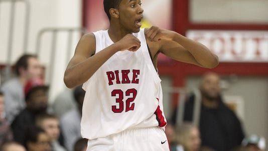 Pike's Tahjai Teague (32) pictured playing Southport, committed to join Ball State's 2015 basketball class.