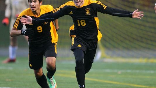 File photo of Greece Athena forward Jason Siracuse reacting to scoring in Athena's win for the Section V Class A1 boys soccer title.