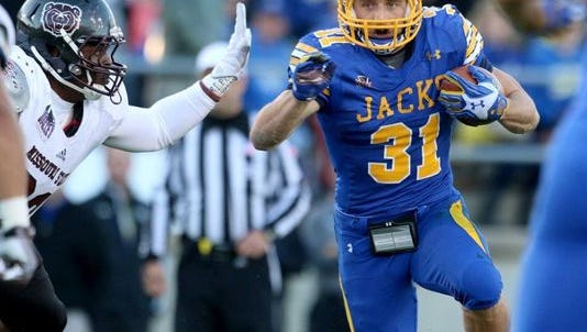 SDSU running back Zach Zenner looks for daylight against Missouri State. The 13th-ranked Jacks host No. 17 Youngstown State today in Brookings.