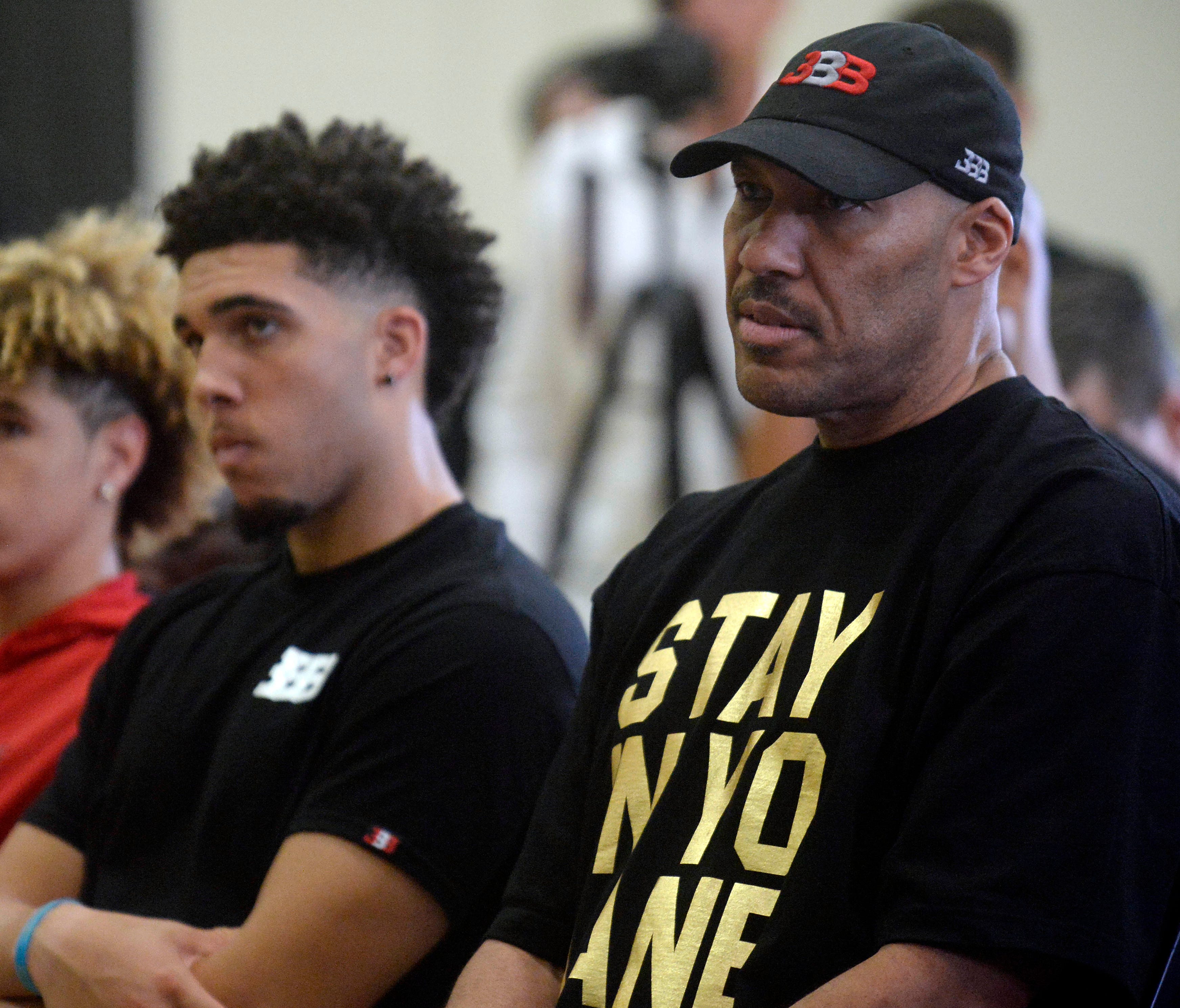 LiAngelo Ball, left, is returning from China, but how will his father, LaVar, react if UCLA disciplines Ball and his two teammates?