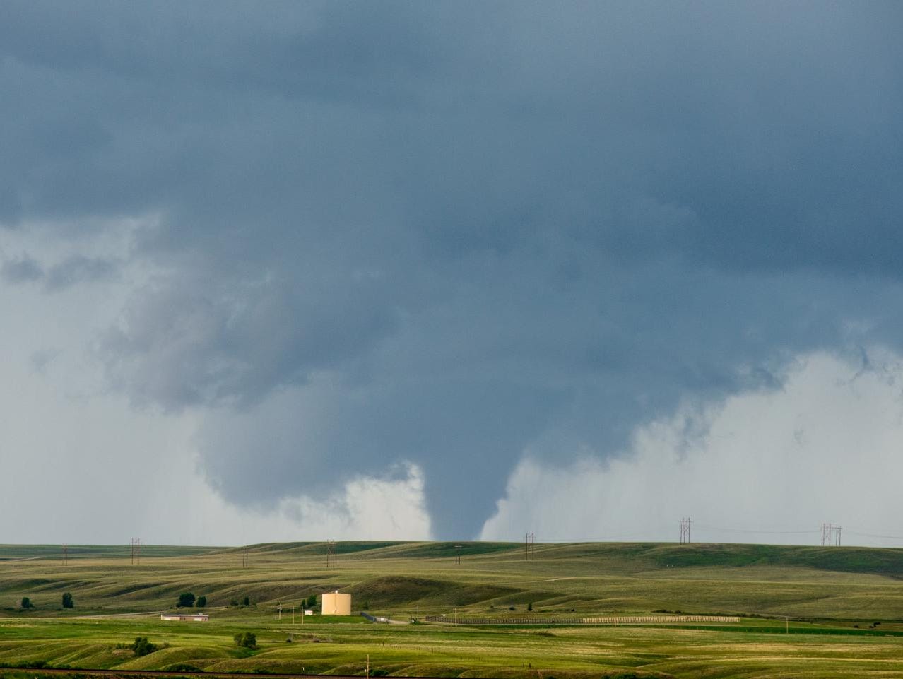 A tornado spins near Laramie Wyo., on June, 15, 2015. The number of tornadoes in outbreaks has been increasing in the past few decades.
