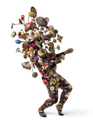 Nick Cave’s “Soundsuits” are made from “found objects,” such as human hair, buttons, beads and fabric.