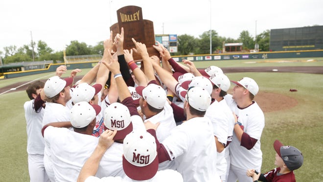 Missouri State’s baseball team celebrates with the Missouri Valley Conference Tournament trophy at Eck Stadium.
