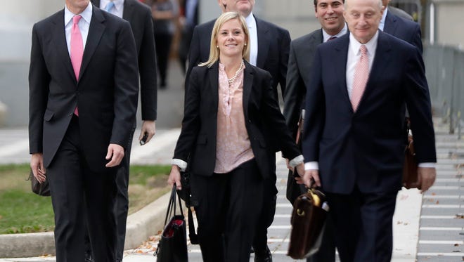 Bill Baroni, left, New Jersey Gov. Chris Christie's former top appointee at the Port Authority of New York and New Jersey, and Bridget Anne Kelly, center, Christie's former deputy chief of staff, depart from Martin Luther King Jr., Federal Court earlier this month.