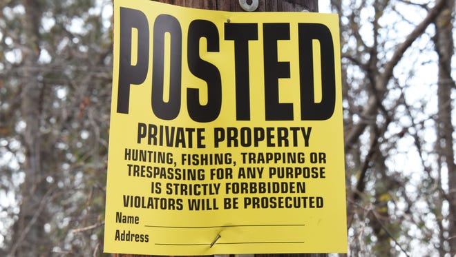 A sign posted at the site of a proposed coal ash landfill near Liberty