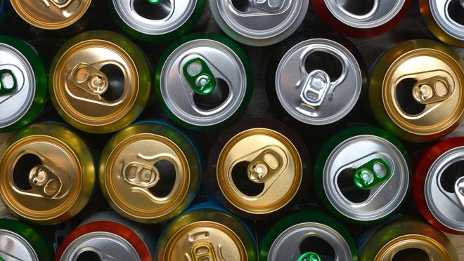 Aluminum cans of assorted colors.