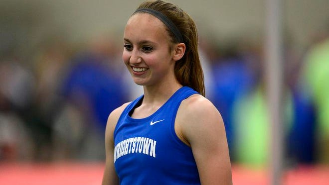 Wrightstown's Bonnie Draxler is all smiles after competing and winning the Div. 2 pole vault during the 2014 WIAA state track and field championships.