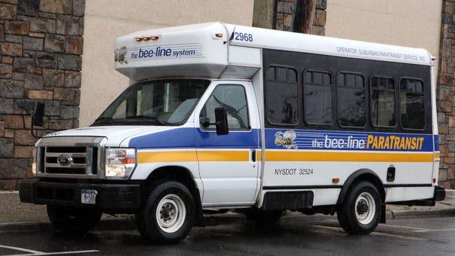 
A Suburban ParaTransit van is parked in front of the Suburban ParaTransit headquarters in White Plains in June. Fully accessible taxis could ease the use of paratransit services.

