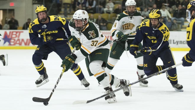 Catatmounts forward Ross Colton (37) skates with the puck during the men's hockey game between the Michigan Wolverines and the Vermont Catamounts at Gutterson Field House on Friday night October 28, 2016 in Burlington. (BRIAN JENKINS/for the FREE PRESS)