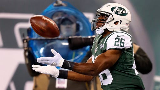 File- This Nov. 17, 2016, file photo shows New York Jets running back C.J. Spiller tries to catch a pass during an NFL football game against the New England Patriots at MetLife Stadium in East Rutherford, N.J. The Kansas City Chiefs have signed  Spiller, providing depth behind Spencer Ware in a move that could mean Jamaal Charles will be cut in a cost-saving move. The Chiefs would owe Charles more than $6 million this season, a big price tag for a running back who missed most of last year to knee surgery.