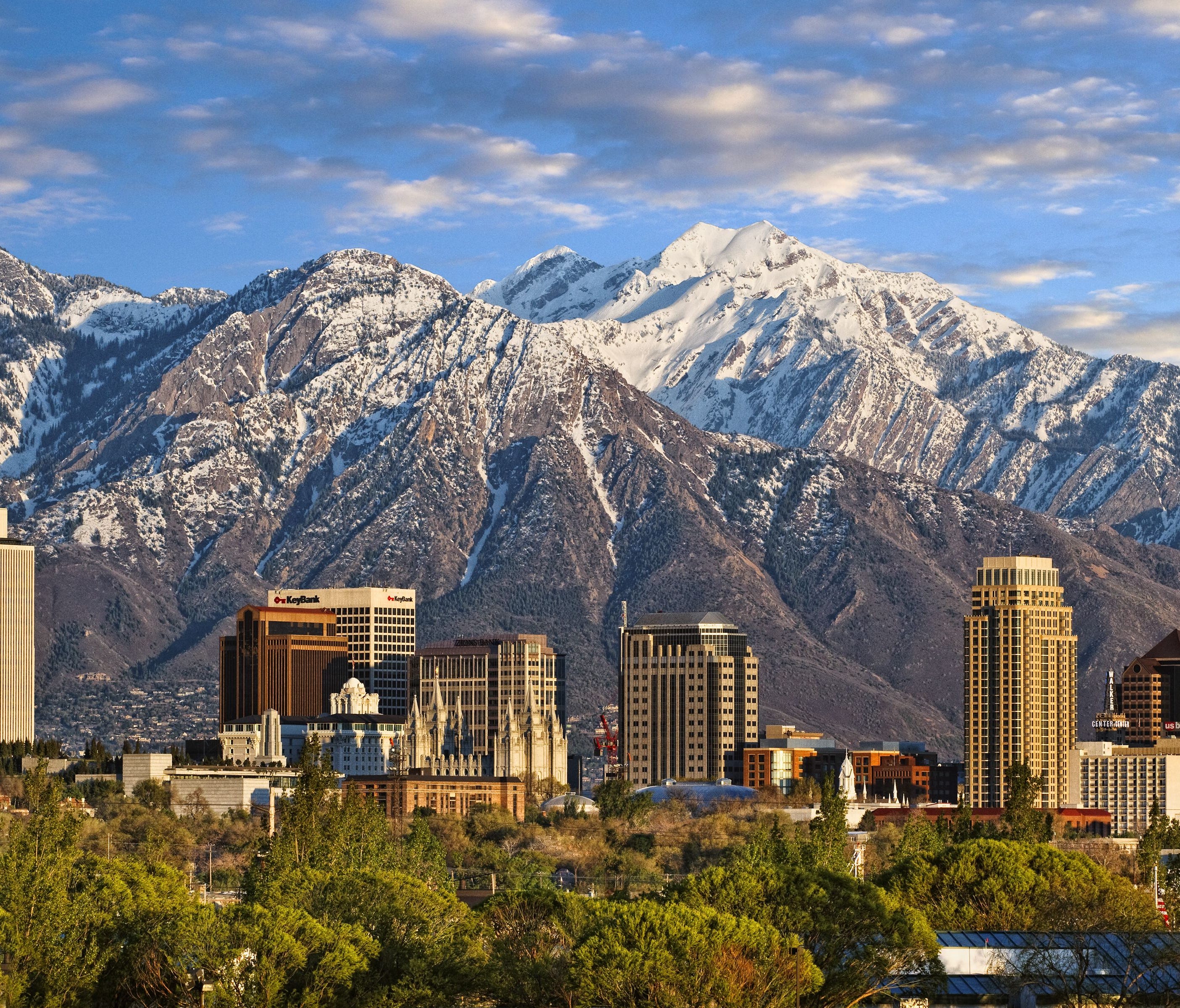Skyline of downtown Salt Lake City with the Towering Wasatch Mountain range in the background