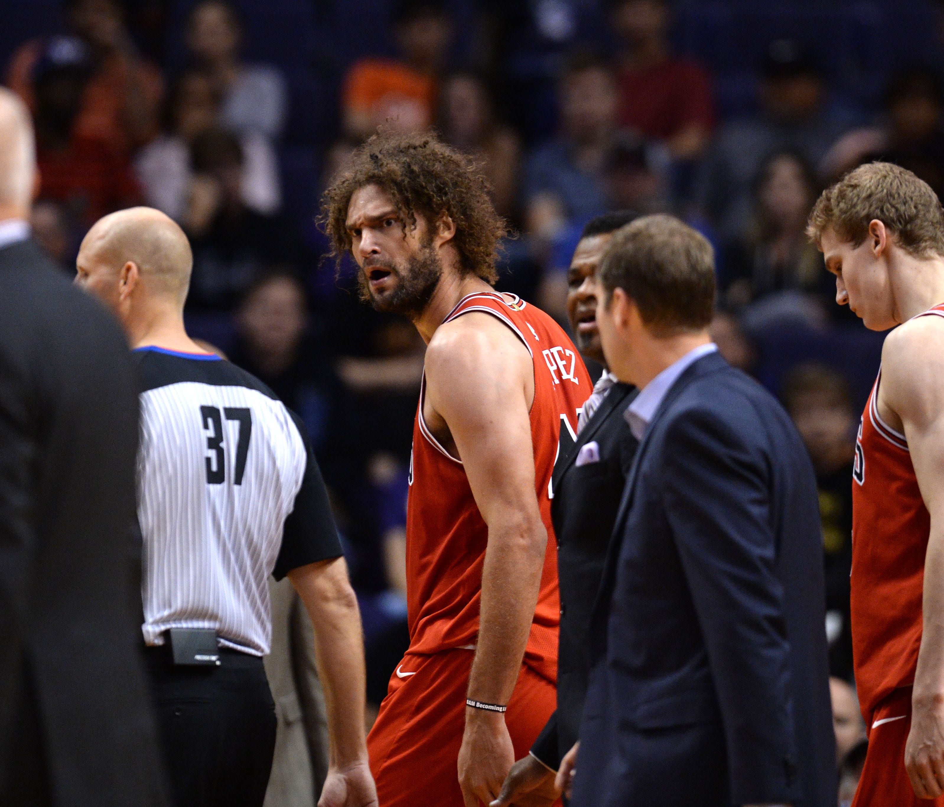 Chicago Bulls center Robin Lopez (42) shouts towards the Phoenix Suns bench after a scuffle during the second half at Talking Stick Resort Arena.