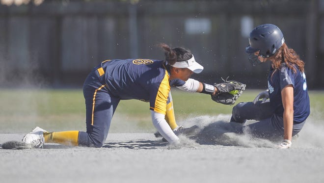 Notre Dame's Aly Gomonet attempts to tag a runner during the Spirits' first-round game against No. 16-seed Mercy-Burlingame. Gomonet went 3-for-4 at the plate with three RBIs in Notre Dame's 11-1 win.
