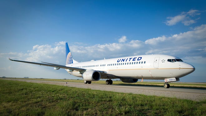 A United Airlines plane taxis to the runway.