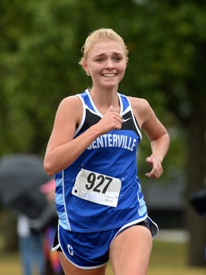Centerville's Ashley Toschlog finishes in first place during the girls race of the TEC cross country meet Saturday, Oct. 3, 2015, at Harter Park in Union City.