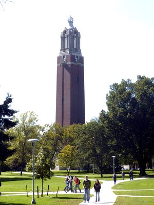 Students crossing the SDSU campus near the campanile in Brookings
