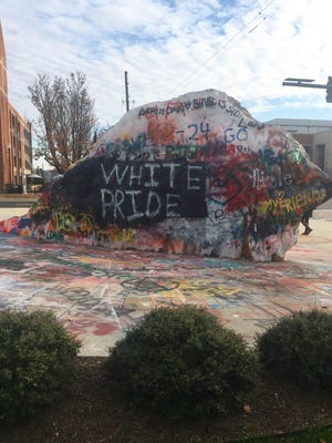 The University of Tennessee's "Rock," was painted with the words "white pride" on Thursday, Dec. 14, 2017. Students and others have condemned the message on social media and asked the university to do more to stop hate speech.