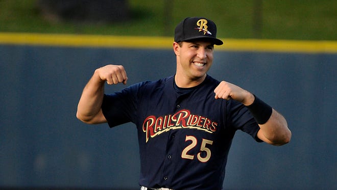 New York Yankees first baseman Mark Teixeira flexes his muscles and smiles Tuesday, June 21, 2016, before playing in a rehab assignment with the Scranton/Wilkes-Barre RailRiders in a Triple-A baseball game against the Toledo Mud Hens in Moosic, Pa.
