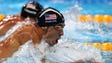 Michael Phelps (USA) races Ryan Lochte (USA) during