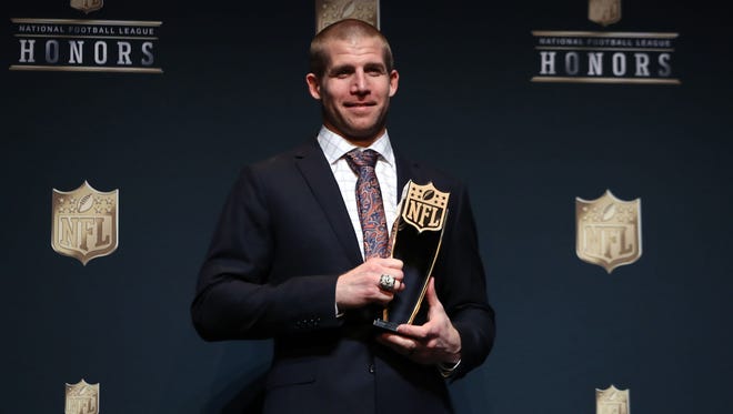Green Bay Packers wide receiver Jordy Nelson holds his trophy after winning Comeback Player of the Year.