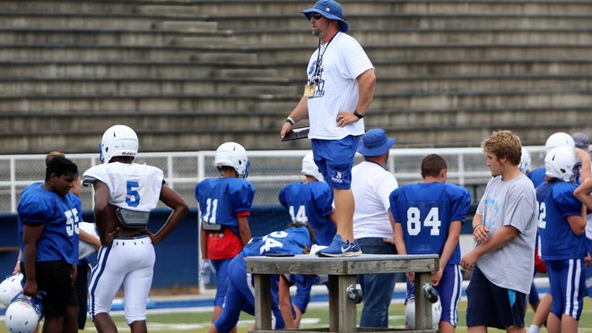 Brevard coach Craig Pritchett instructs his players during practice last year at Brevard.