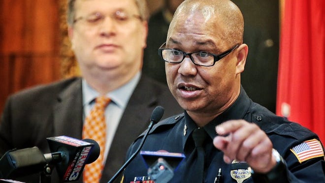 Flanked by Memphis Mayor Jim Strickland (left) Interim MPD Director Michael Rallings talks during a July 11 press conference at City Hall about a Black Lives Matter protest in Memphis.