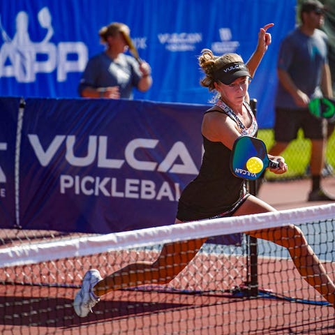 Pro player Corrine Carr competing in a pickleball 