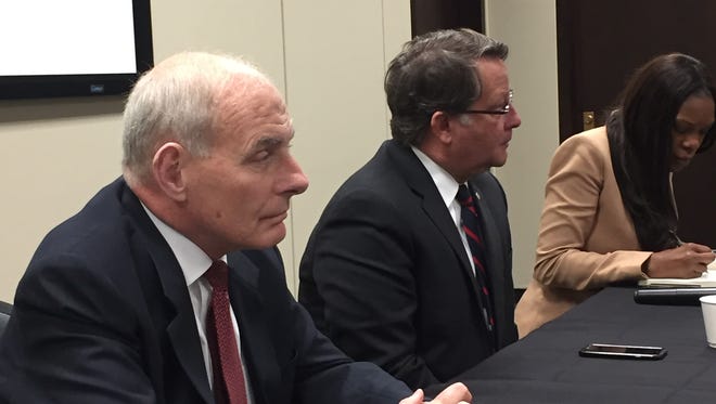 Secretary of the Department of Homeland Security John Kelly meets with immigrant advocates at Detroit Metro Airport on March 27, 2017. On his left is U.S. Sen. Gary Peters of Michigan.
