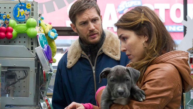 Tom Hardy and Noomi Rapace in a scene from 'The Drop.'
