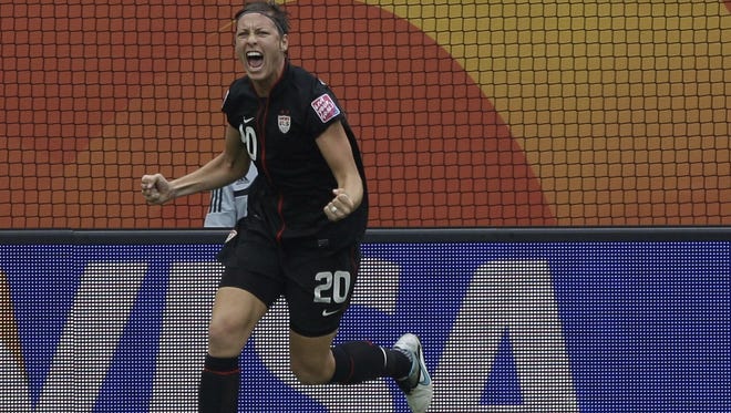 United States' Abby Wambach reacts after Brazil scored an own goal during the quarterfinal match between Brazil and the United States at the World Cup in Dresden, Germany, on July 10, 2011.