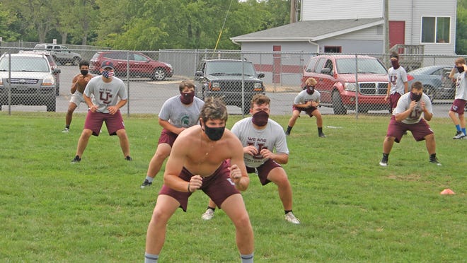 The Union City Chargers, shown here during conditioning after the postponement of their season, got the news along with the rest of the state that football will return with a special 6 game season beginning next week.k