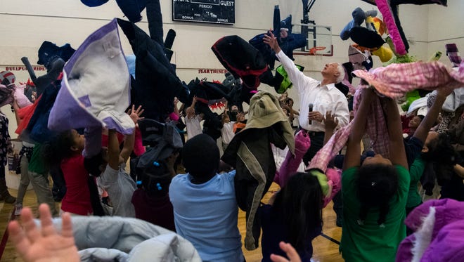 Steve Schmitt (center), owner of Don’s Claytons DCI Fine DryCleaning, kicks off the Coat-A-Kid program with first and second grade students at Glenwood Leadership Academy in Evansville, Ind., Tuesday, Oct. 24, 2017. Each year, from October through December, community members are invited to donate gently used and new coats to any Don’s Claytons location. 