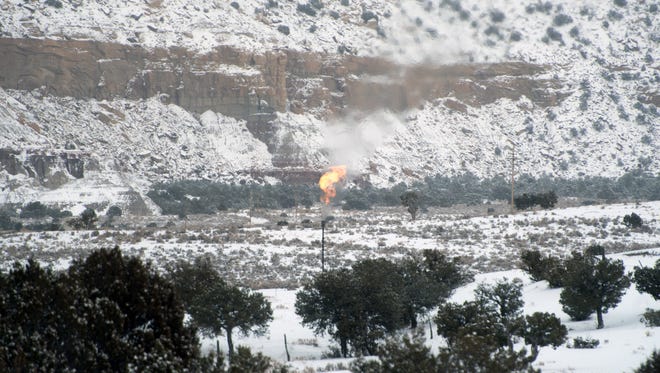 Natural gas is flared Jan. 8 at a gas well near Lybrook.