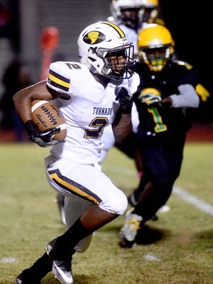 Haynesville's Kavacion Webster runs for two of his 147 yards against Green Oaks Thursday night.