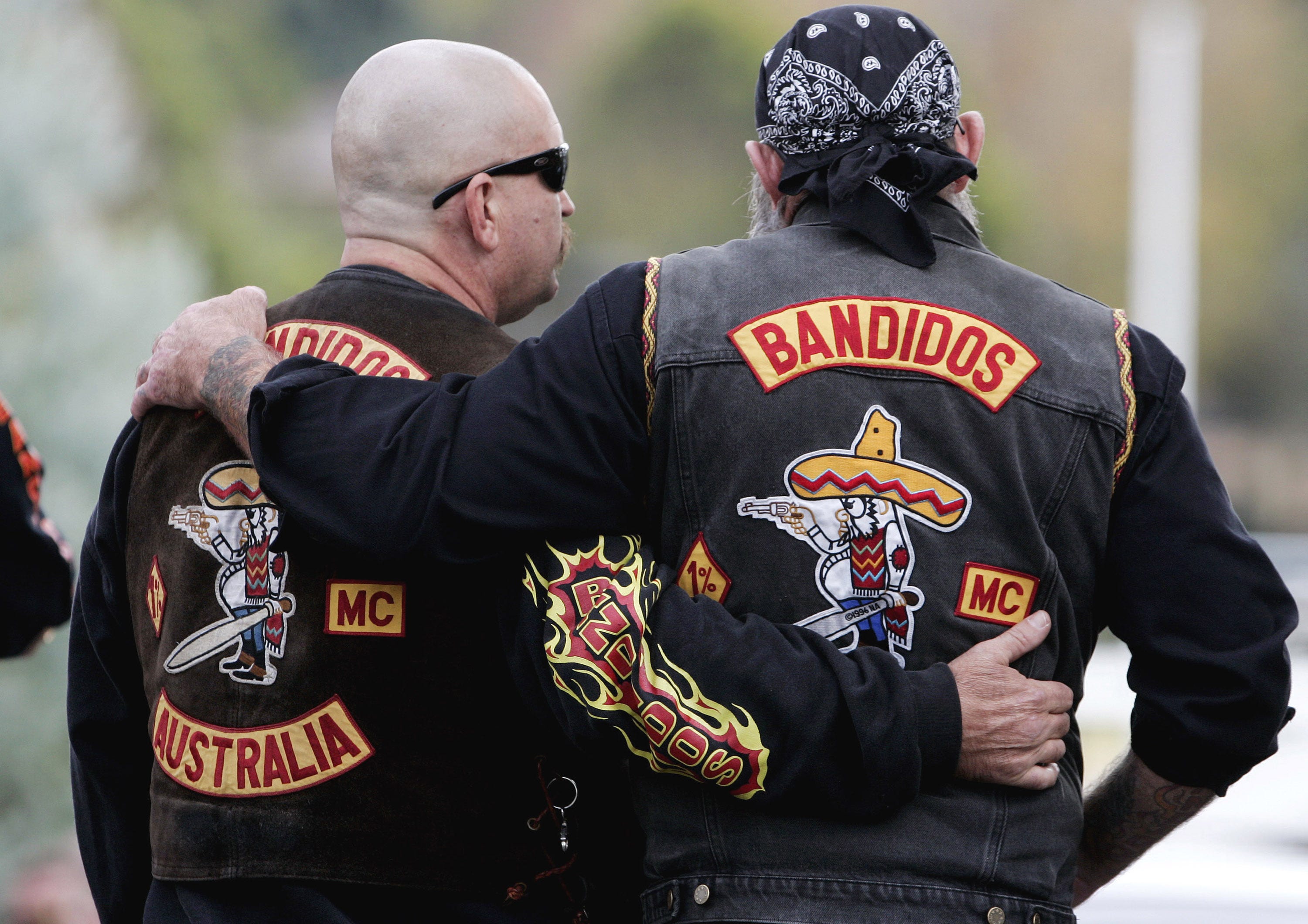 bikie biker gang initiate wife