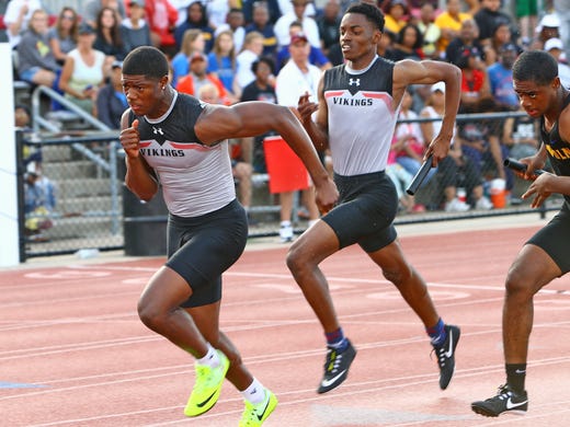 Princeton runners Enoch Brookins, right, and Kenny