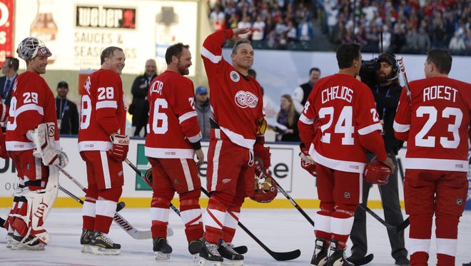 Darren McCarty salutes fans before an alumni game against the Avalanche in February.